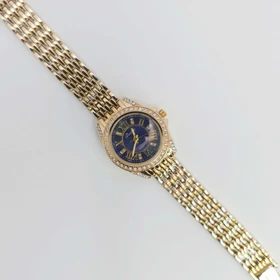 ساعت مچی زنانه باوک Baoke نگین‌دار با موتور کوارتز (بند طلایی صفحه سورمه ای)