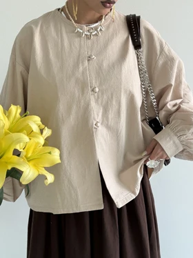 شومیز دکمه مرواریدی