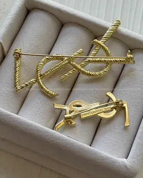 سنجاق سینه ایو سن لورن ysl