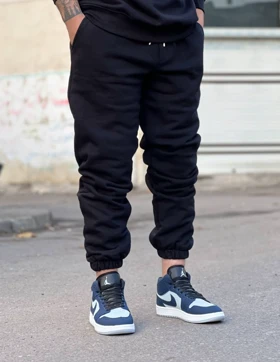 شلوار جاگر مشکی پارچه دورس خار خورده استایل فوقالعاده شیک 2025