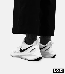 کفش کتانی مردانه و زنانه سفید مشکی Nike guide 10