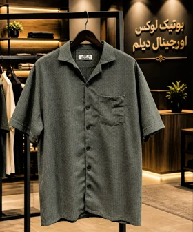 پیراهن یقه انگلیسی سبز یشمی تک جیب قواره لش باکسی Q 25487