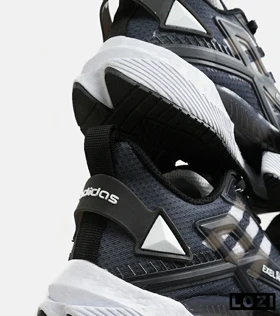 کفش کتانی مردانه و زنانه مشکی سفید Adidas SUPERNOVA 3