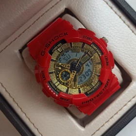 ساعت مچی اسپرت طرح جیشاک 110 رنگ قرمز صفحه طلایی