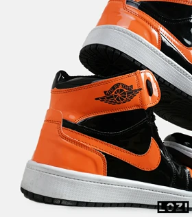 کفش کتانی مردانه و زنانه ساق‌دار مشکی نارنجی ورنی NIKE jordan 1