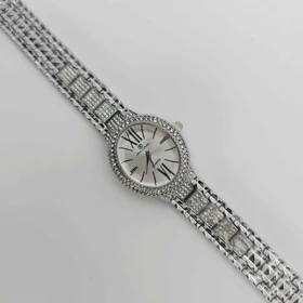 ساعت مچی زنانه مجلسی ریلانس Riluns نگین‌دار با موتور کوارتز (نقره ای صفحه سفید)