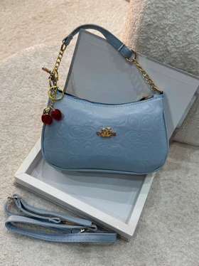 کیف دوشی و دستی دخترانه کوچ چاپدار (آبی مه آلود)