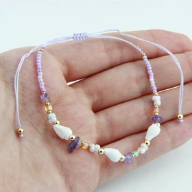 دستبند مهره ای مدل صدف و مهره (بنفش روشن)