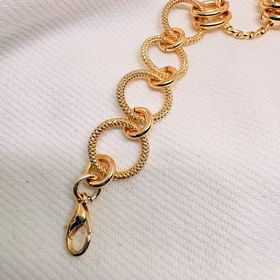 دستبند برند شین مدل «حلقه‌های درهم‌تنیده» | بافت برجسته