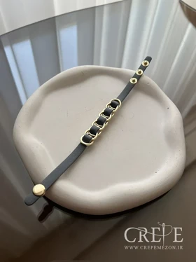 دستبند چرم طرح برند (طوسی)