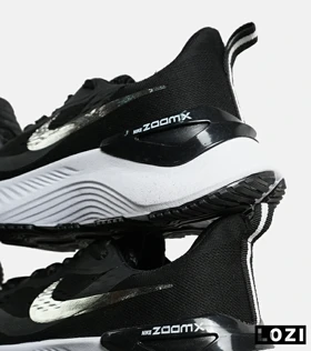 کفش کتانی مردانه و زنانه مشکی طلایی NIKE zoom X مدل 7158