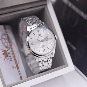 ساعت مچی مردانه اولوز OLEVS بند استیل نقره ای صفحه نمایش سفید