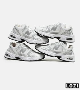 کفش کتانی مردانه و زنانه سفید طوسی نقره ای NEW BALANCE 530 مدل 5637