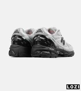 کفش کتانی مردانه و زنانه طوسی مشکی New Balance 1906R مدل 7539