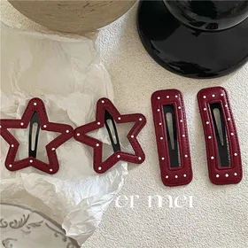 گیره ژورنالی خالدار چرم
