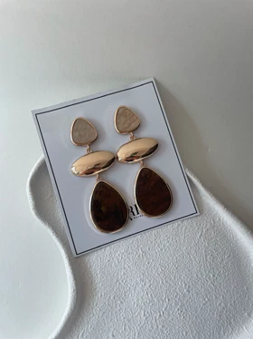 گوشواره دفرمه آویزی