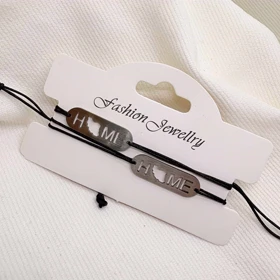 دستبند استیل مدل «HOME - ایران» | بند بافت مشکی با پلاک نقره‌ای