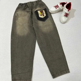 شلوار جین مام زاپ‌دار پشت جیب خرسی