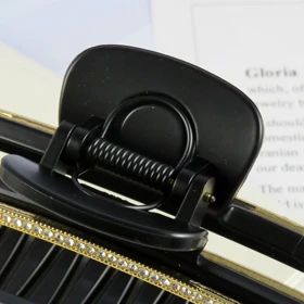 کلیپس مو زنانه مدل نگین‌دار مجلسی کد G_Lnd_1479