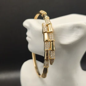 بنگل- دستبند- ژوپینگ زنانه طرح طلا کد 3083m