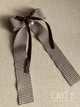 گیره پاپیون و مروارید دنباله دار