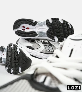 کفش کتانی مردانه و زنانه سفید خاکستری NEW BALANCE 530