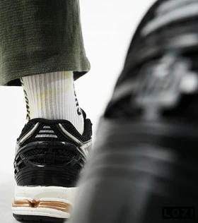 کفش کتانی مشکی طلایی Newbalance 1906R