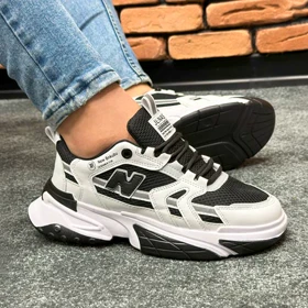 کتانی اسپرت مردانه مدل نیوبالانس NEW BALANCEرنگ سفید مشکی