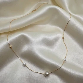 گردنبند ژوپینگ مدل "اشک فرشته" | ترکیب مروارید و گوی طلایی با درخشش ابدی