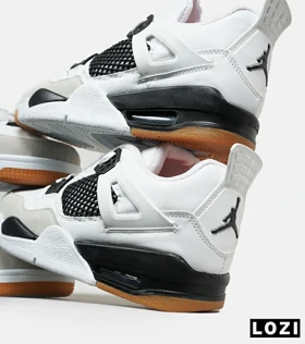 کتانی ساق‌دار بزرگ پا سفید طوسی Nike air jordan 4