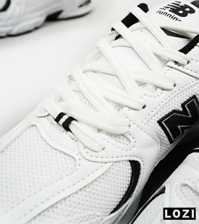 کفش کتانی مردانه و زنانه سفید مشکی NEW BALANCE 530