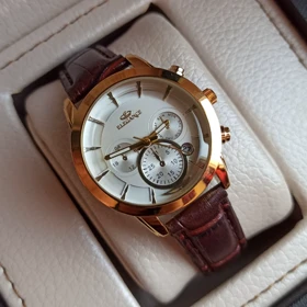 ساعت چرمی زنانه الگانس طرح سه موتور تقویم دار بند قهوه ای