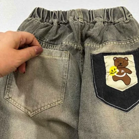 شلوار جین مام زاپ‌دار پشت جیب خرسی