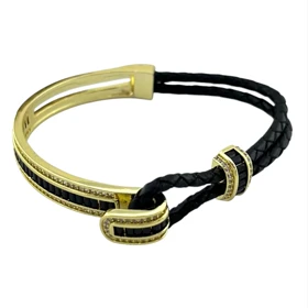 دستبند زنانه مدل آدلیا مشکی با بافت چرمی و جزئیات طلایی