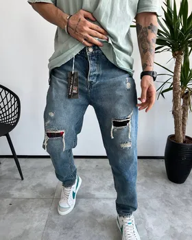 شلوار مام فیت رنگ خاص زاپ‌دار LEVIS