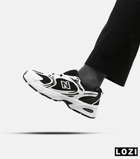 کفش کتانی مردانه و زنانه سفید مشکی NEW BALANCE 530