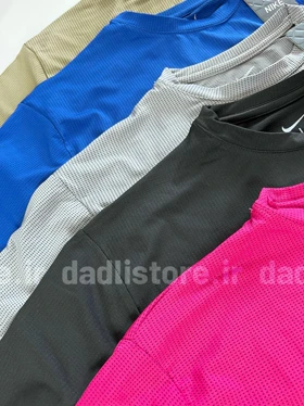 کراپ ورزشی آستین کوتاه بغل چاک‌دار نایکی Nike