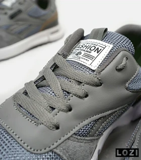 کفش کتانی طوسی سیر REEBOK Unphased Pro