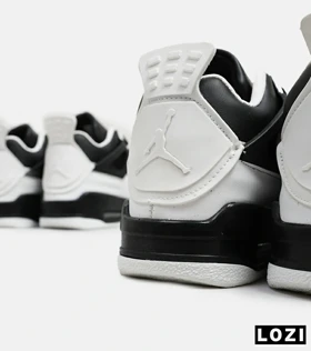 کتانی ساق‌دار مردانه مشکی سفید Nike air jordan 4