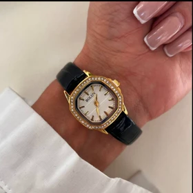 ساعت مچی زنانه برند بولون بند چرمی مشکی دور نگین