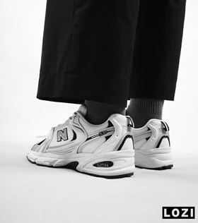 کفش کتانی مردانه و زنانه سفید نقره ای NEW BALANCE 530