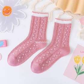 جوراب ساق‌دار گل‌گلی صورتی