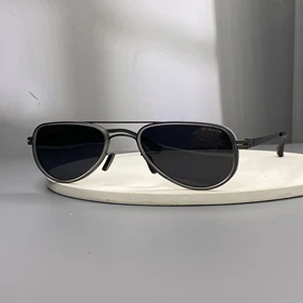 عینک آفتابی آیس‌برلین با فریم تیتانیوم و لنز پلی‌کربنات پلاریزه UV400 انعطاف‌پذیر و نشکن