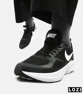 کفش کتانی مردانه و زنانه مشکی سفید Nike guide 10