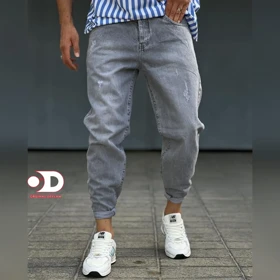 شلوار جین مام فیت طوسی مردانه پارچه کجراه پنبه