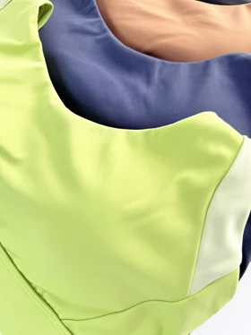 نیم‌تنه کاپ‌دار ورزشی حرفه ای قزن دار فلامنت بند ضربدری