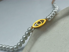 دستبند مروارید و استیل چشم