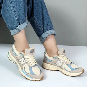 کتانی نیوبالانس زنانه اسپرت مدل 2002R رنگ کرم آبی کد 78922