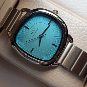 ساعت مچی زنانه دفرم DW طرح جولیوس بند استیل صفحه آبی