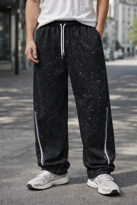 شلوار جاگر نیم بگ طرح کهکشانی پارچه گلکسی پنبه کیفیت پرمیوم قد 110 سانت